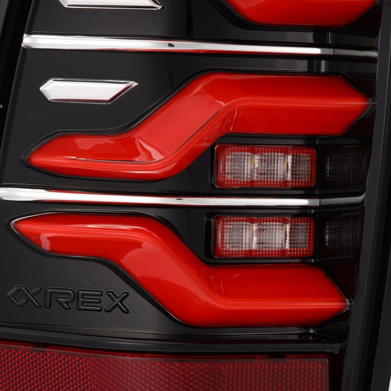 AlphaRex 05-15 Toyota Tacoma LUXX LED Taillights Blk/Red w/Activ Light/Seq Signal 680070 *Discontinued