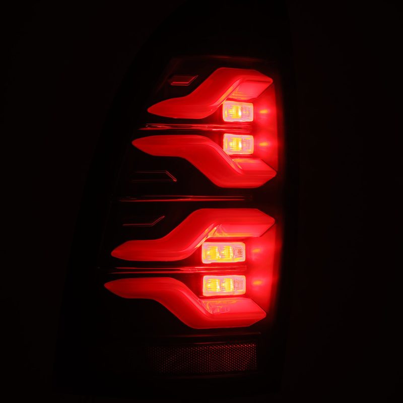 AlphaRex 05-15 Toyota Tacoma LUXX LED Taillights Blk w/Activ Light/Seq Signal 680060 *Discontinued